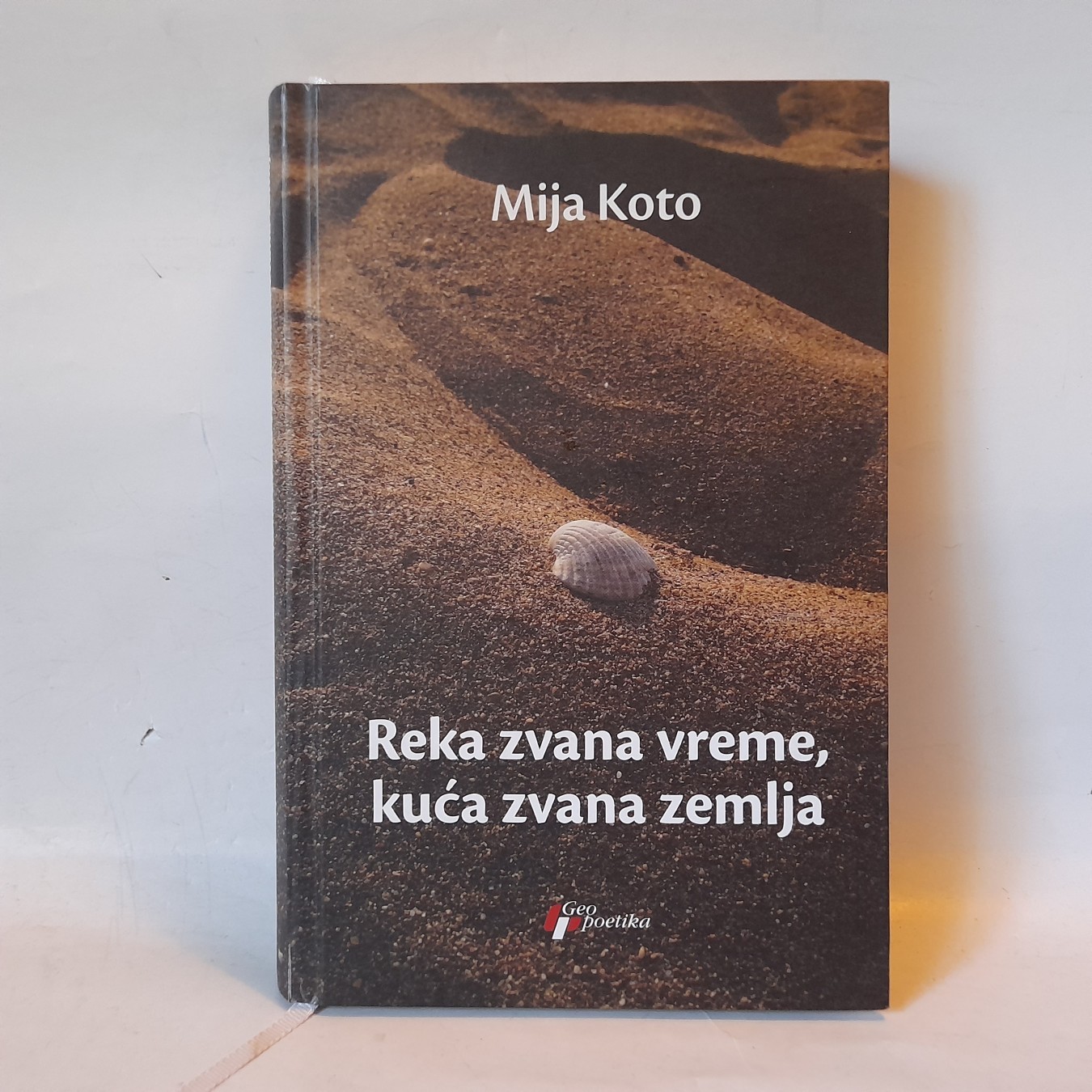Reka zvana vreme, kuća zvana zemlja — Mija Koto
