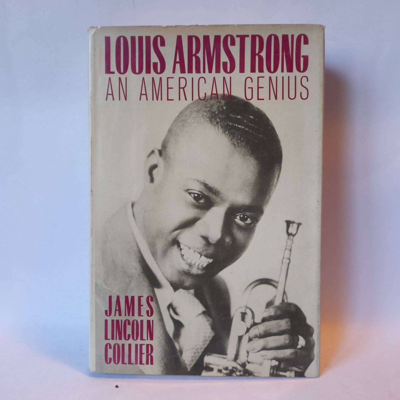 Louis Armstrong, an American Genius — Džejms Linkoln Kolijer